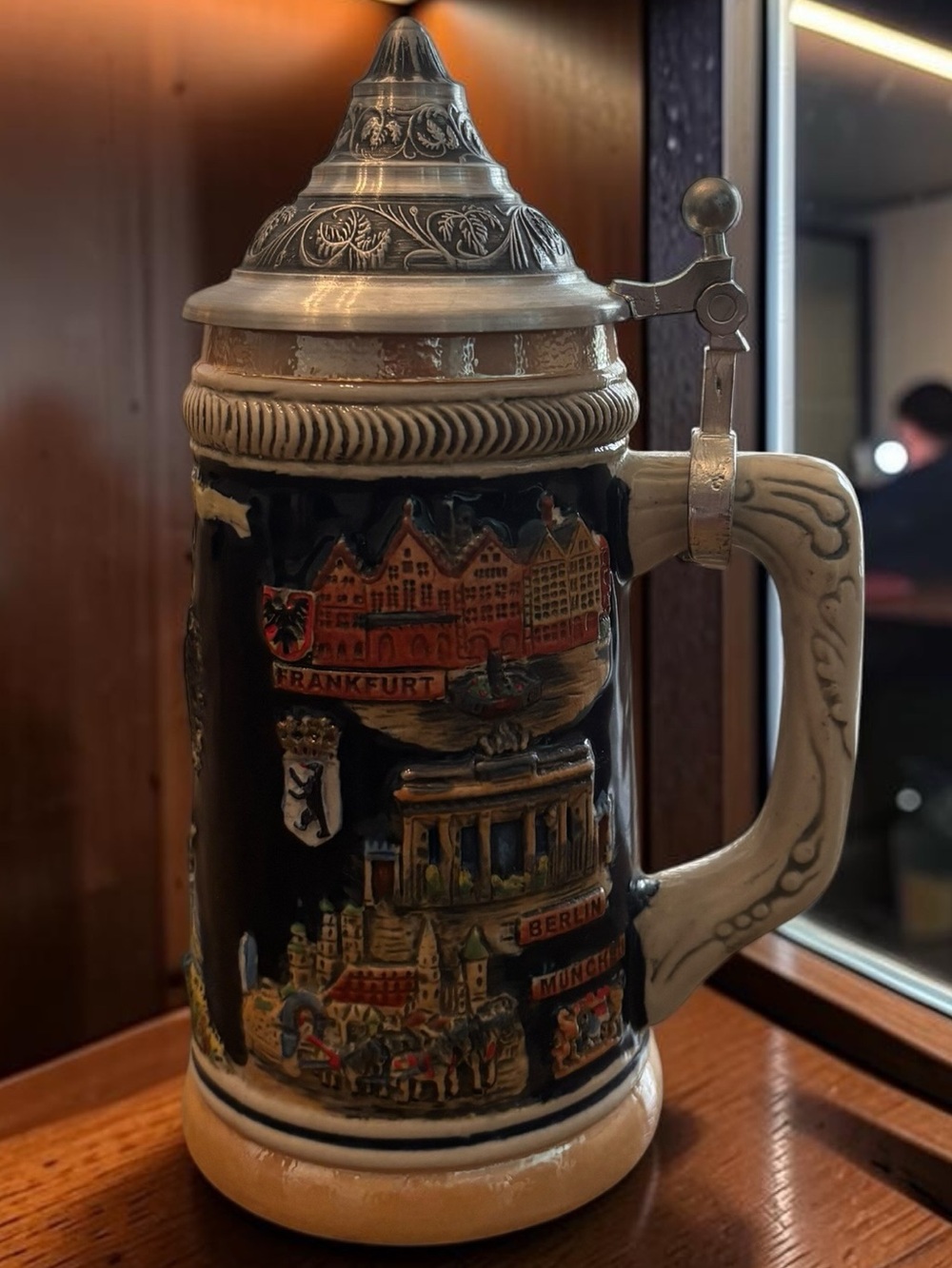 Ceramic German Stein Travel Scenes Mug in Black and Cream